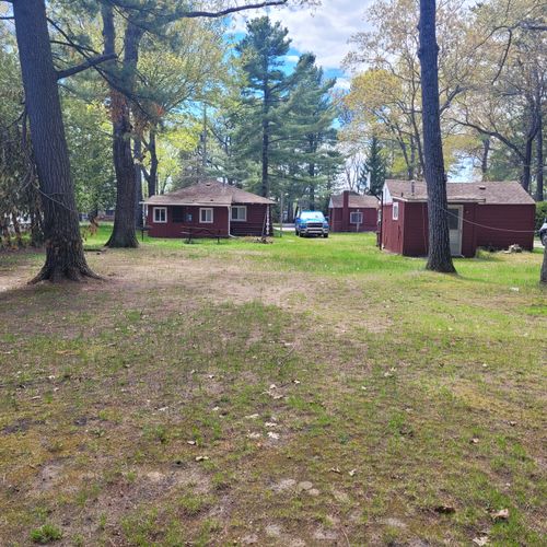 Exterior:  the large family-friendly backyard with picnic table, firepit, and charcoal grill