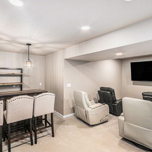 Enjoy the view from the well-lit ground-level family room—bright, cozy, and perfect for downtime.