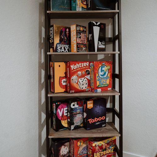 - browse an impressive collection of party games, trivia, classics, and laugh out loud favorites
- from hedbanz to taboo, there’s something for every age and mood
- organize game night with ease thanks to this stylish shelf setup