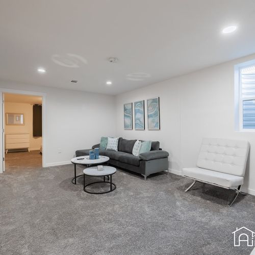 The spacious lower level living room is great for big groups and can seat 10 comfortably.