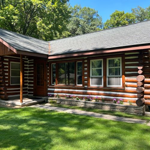 Exterior:  another view of the front of the cabin in summer.