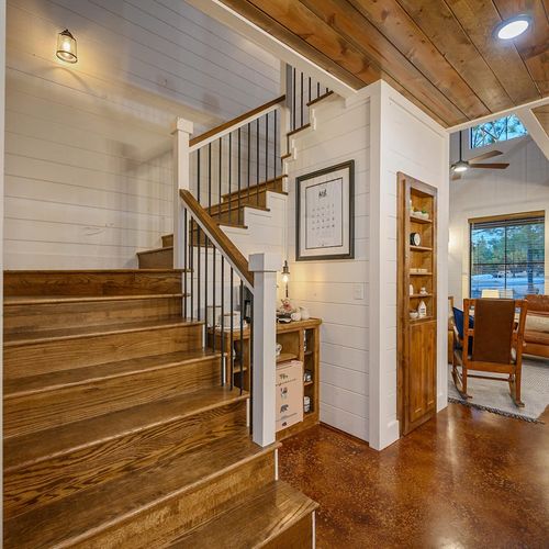 Upstairs to the loft and additional bedrooms.