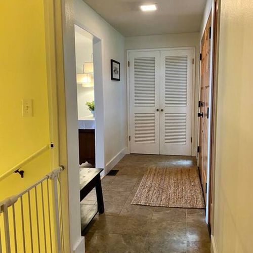 The stair gate safely leads you downstairs to the laundry room and guest bedroom ensuite.