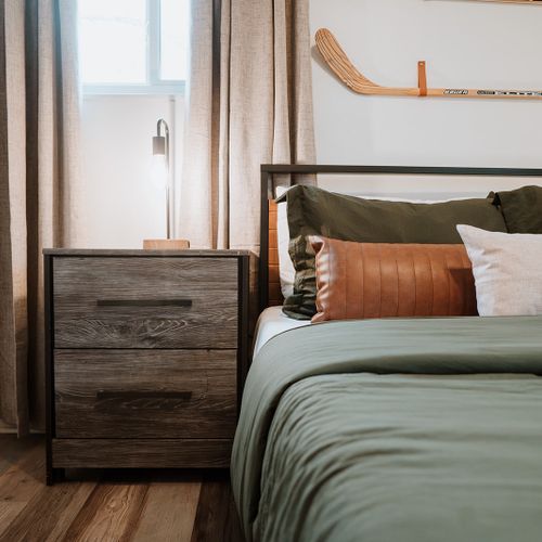 Unwind in comfort, bathed in natural light, surrounded by the invigorating essence of hockey-themed charm. All bedrooms feature closets for your storage needs.