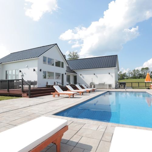 Upon arriving you'll get a glimpse of the beautiful pool as you head around the back to the main entrance!