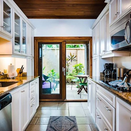 Beautiful fully equipped kitchen and an outside small patio with a BBQ.