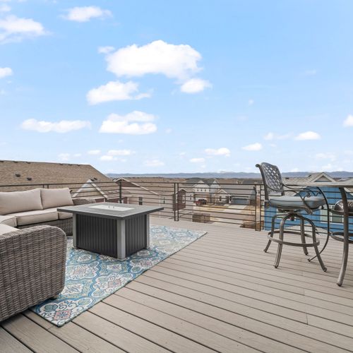 Spacious deck lounge with scenic views made for sunset selfies.