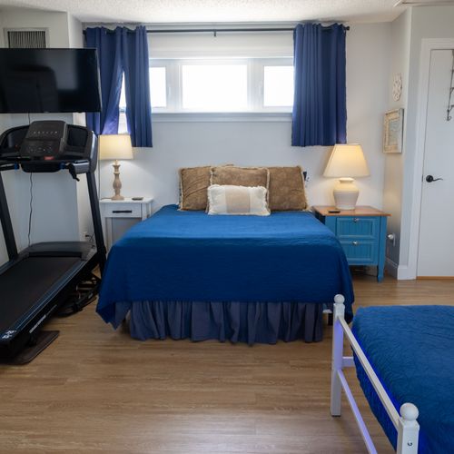 Room features a treadmill positioned perfectly to take in sea views.