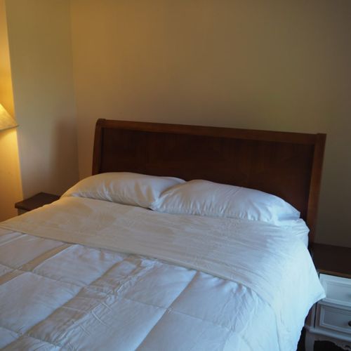 Bedroom #1:  features a queen-size bed, desk, and a nice view of lake michigan!