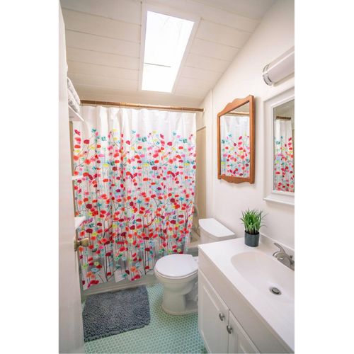 Upstairs full bathroom with tub/shower combo