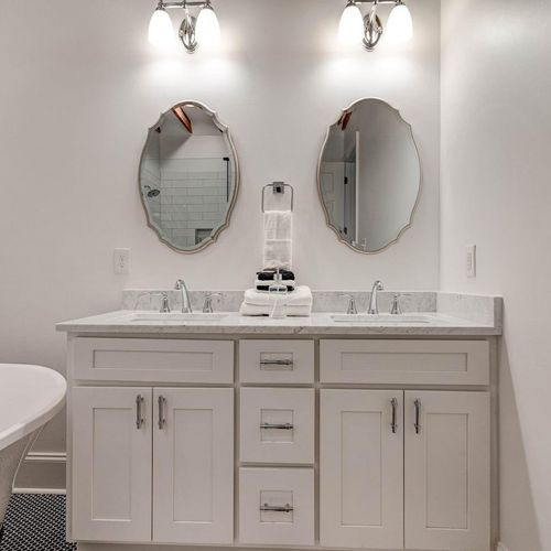 Master ensuite w/ double sinks & generous counter space for two.