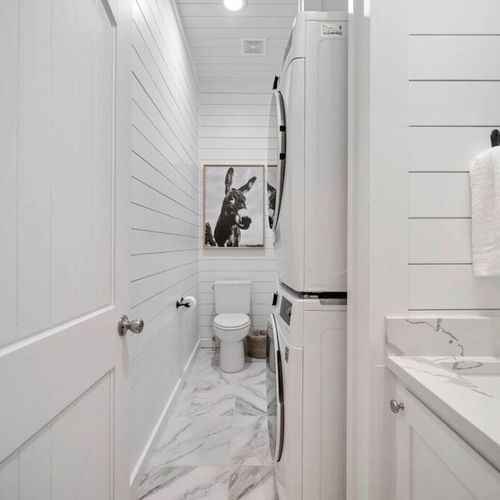 Laundry & half bath off the kitchen.
