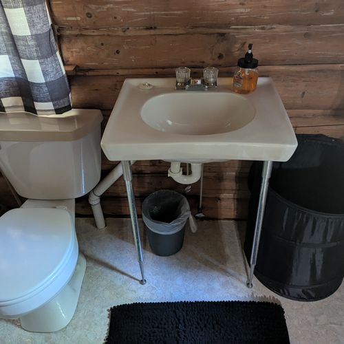 Bathroom:  the bathroom sink and toilet
