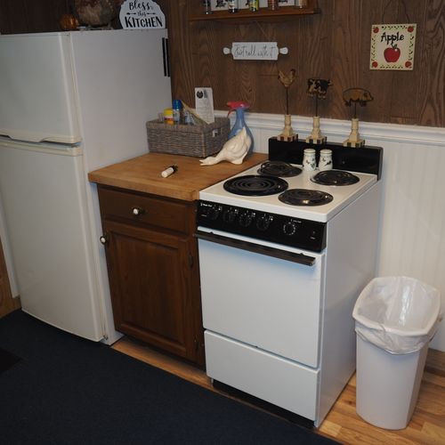 Kitchen:  full kitchen including sink, counter, cabinets, refrigerator, electric range and a good supply of cooking and dining utensils.