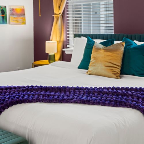 Plush bedding awaits — sink into softness and pure relaxation.