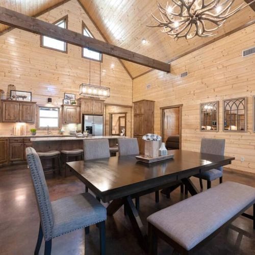 The dining area seamlessly transitions into the kitchen