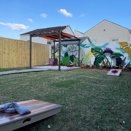 outdoor space that comes with corn hole and a bunch of other fun outdoor games!