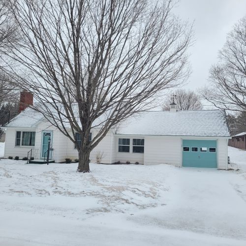 Overall:  the front of the house in winter