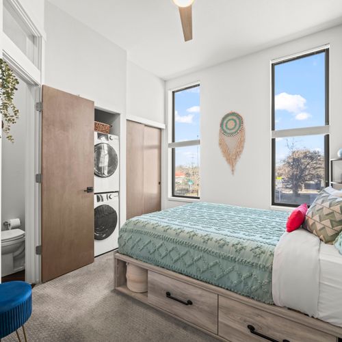 Private master bedroom with ensuite, smart storage, and integrated laundry for everyday convenience.