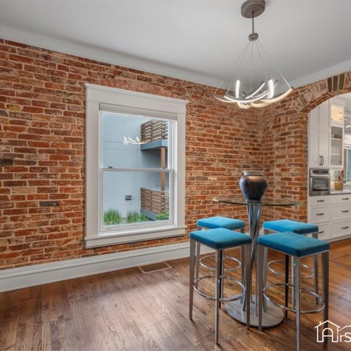 A stunning mix of original details and modern luxurious design, this home dazzles at first glance.