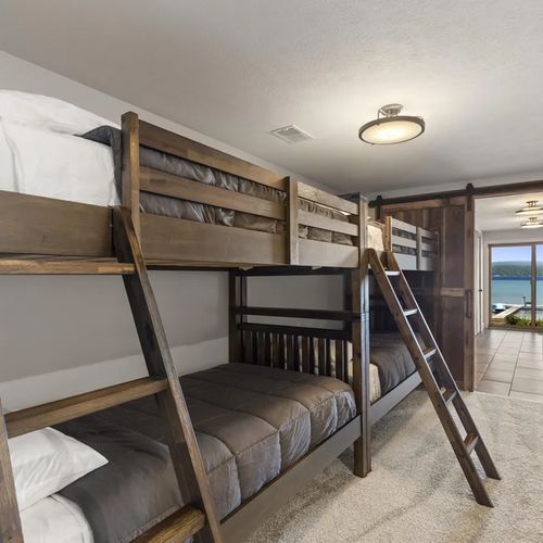BEDROOM #6 (LOWER LEVEL):  Like Bedroom #5, this bedroom features 2 bunk beds and sleeps 4 people.