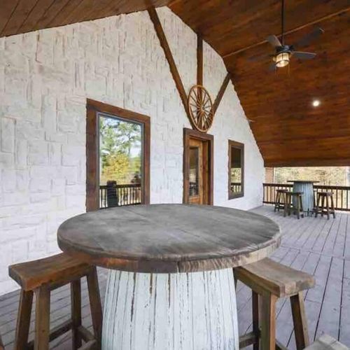 The covered patio features many tables so guests can choose their preferred spot