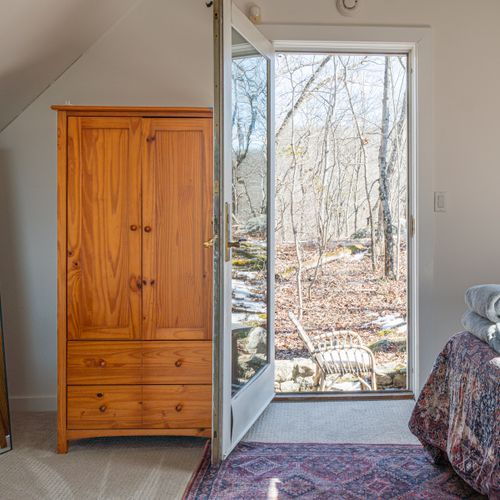 Step out onto the petite patio just outside the bedroom door.