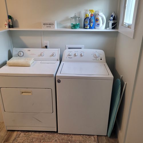 LAUNDRY ROOM:  Convenient laundry room with washer, dryer, and sink just off of the kitchen.