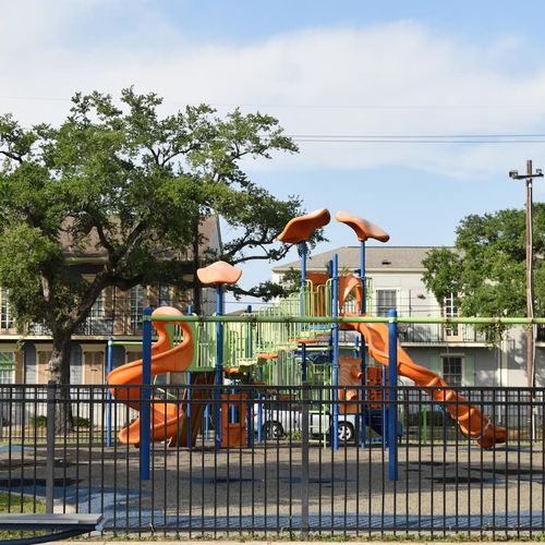 Lafitte Greenway Park just steps away — a vibrant spot for outdoor fun & play.