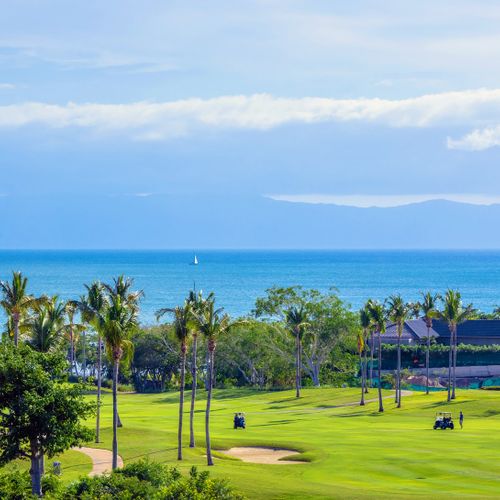 Captivating Views from the Balcony of the Pacific Ocean and Pacifico Golf Course