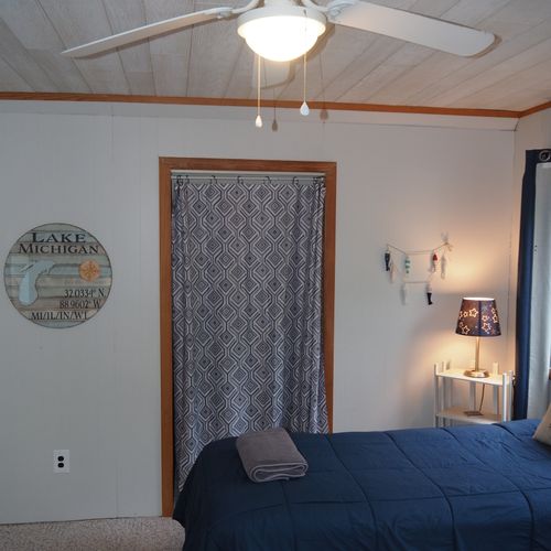 Bedroom #4 (second floor):  features 3 twin-size beds, nightstands with lamps, ceiling fan, closet, dresser, chair, and its own private television.