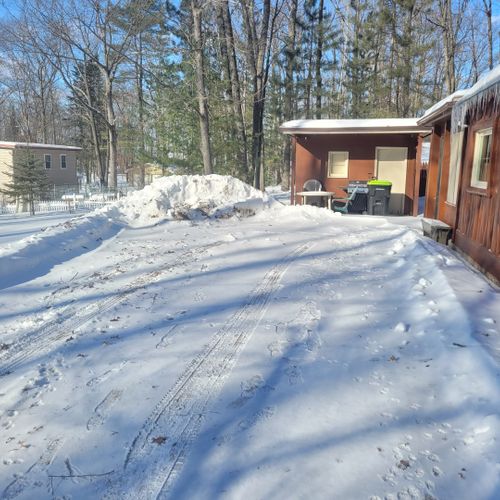 Exterior:  the home has a large driveway, which works well for snowmobiles.