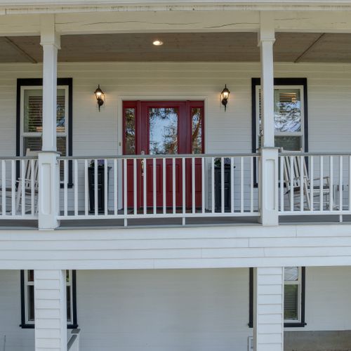 Through the front door you enter the main living area and master bedroom suite.