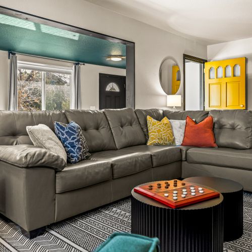 Spacious, stylish, and centered around a couch everyone will fight to claim.