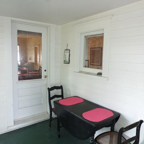 Porch:  the cottage has a huge wrap-around porch that is fully enclosed and has great views of crystal lake!
