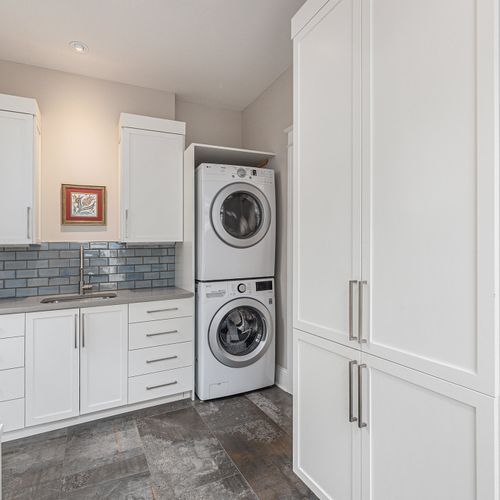 Laundry room equipped with facilities for convenience and efficiency.