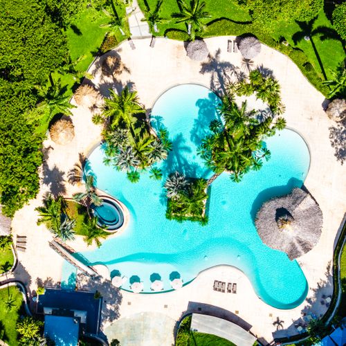 Ariel view of the lagoon pool with a pool bar