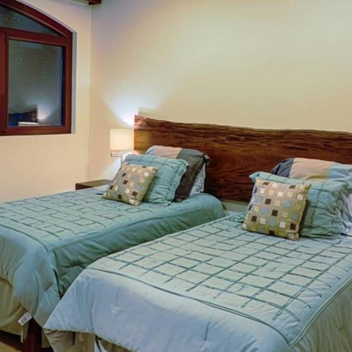 Two twin beds, this room would be perfect for kids.
