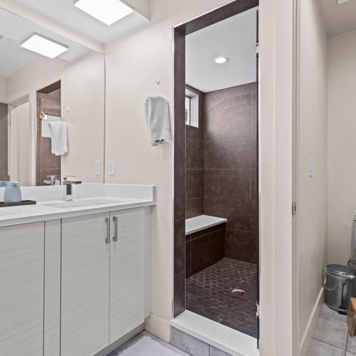 Bright and expansive walk-in shower on the top floor.