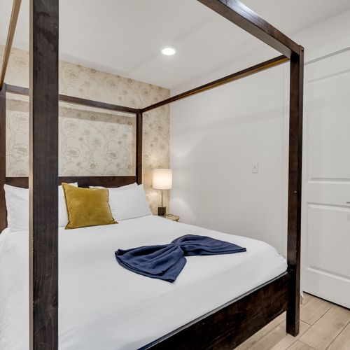 Recharge in a dreamy French Quarter bedroom where vintage charm meets modern comfort.