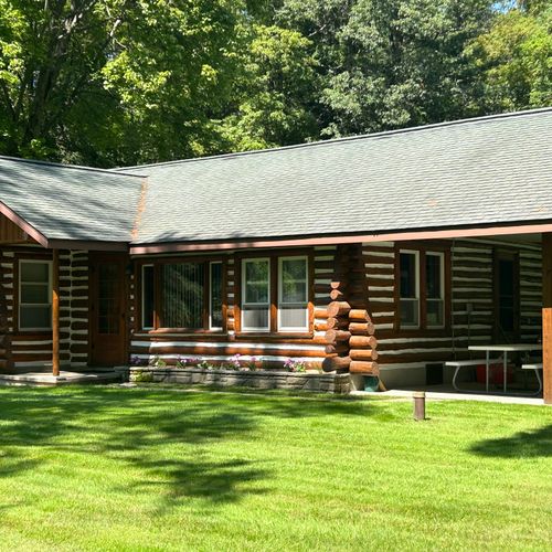 Exterior:  another view of the front of the cabin in summer.