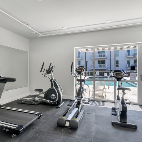 Stay active in our on-site fitness room, complete with views of the pool.