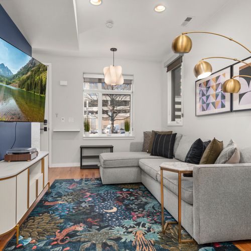 Stylish living room made for lounging, streaming favorites, and relaxing together