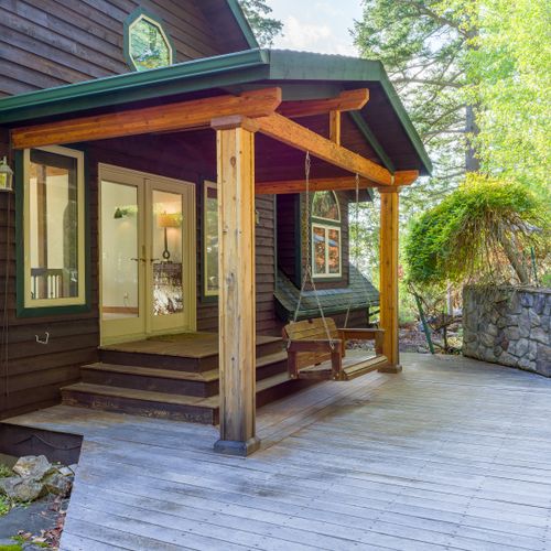 Gardens and decks with seating surround the house.  You can walk the paths and explore the property.