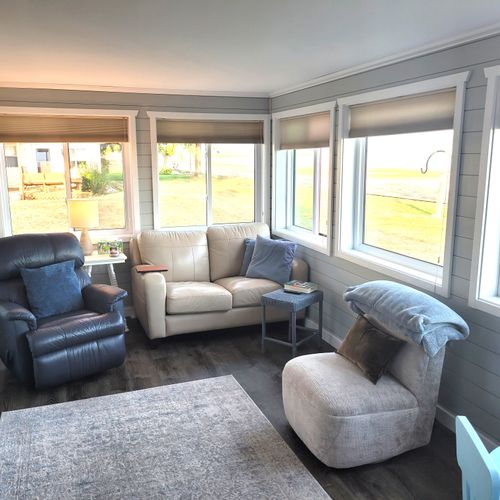 SUNROOM:  The home has a very fun and family-friendly sunroom off of the living room.  It features great views of Lake Huron.