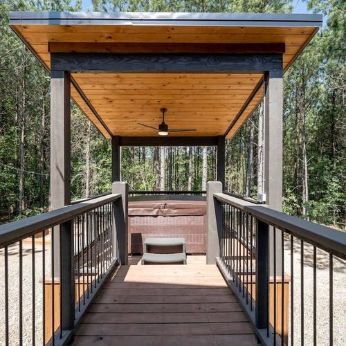 The hot tub is off the porch!