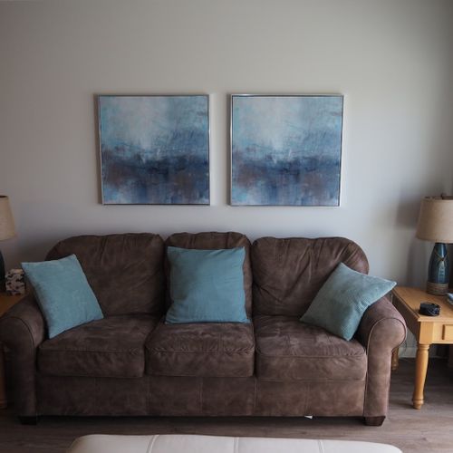 Living room:  features a sofa, comfy chair, ottoman, large screen television, and a desk and chair. (note that guest usage of the fireplace in the living room is strictly prohibited. )