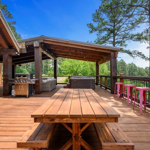 A picnic style table on the patio.