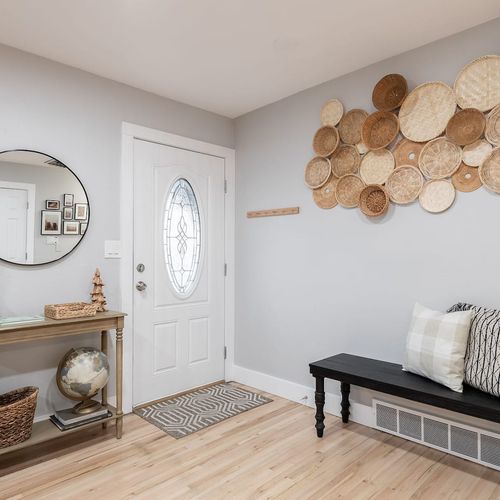 - step into a bright and charming entryway that feels instantly inviting
- set the tone with woven wall art and a cozy bench for easy arrivals and departures
- catch your reflection or stash essentials on the beautifully styled console table