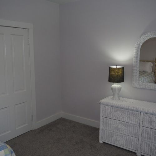 Bedroom #3:  all 3 bedrooms are upstairs. This bedroom features two twin-size beds, a nightstand with a lamp, a dresser with a mirror, and a large closet.
